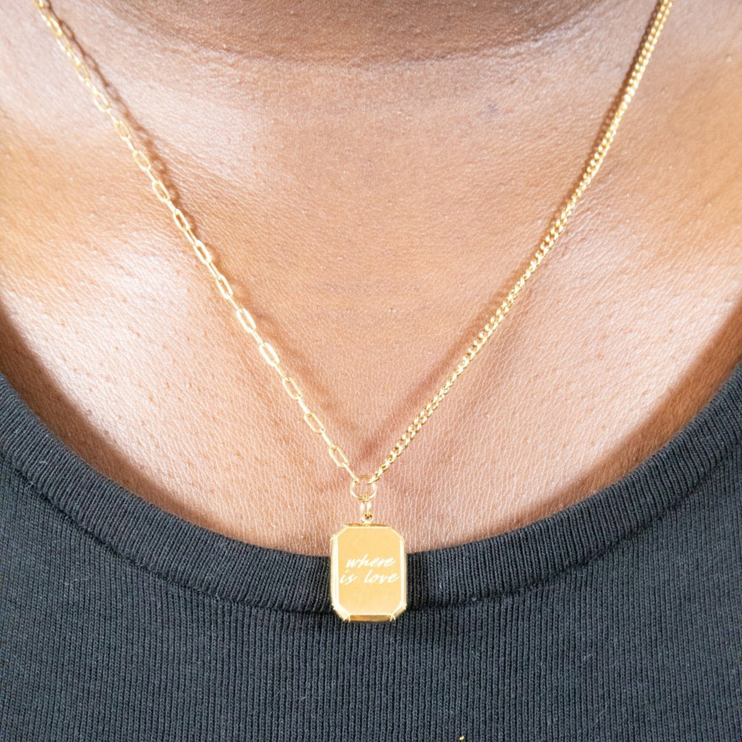 An engraved gold necklace that says "where is the love". Paperclip chain crafted with 100% recycled gold.