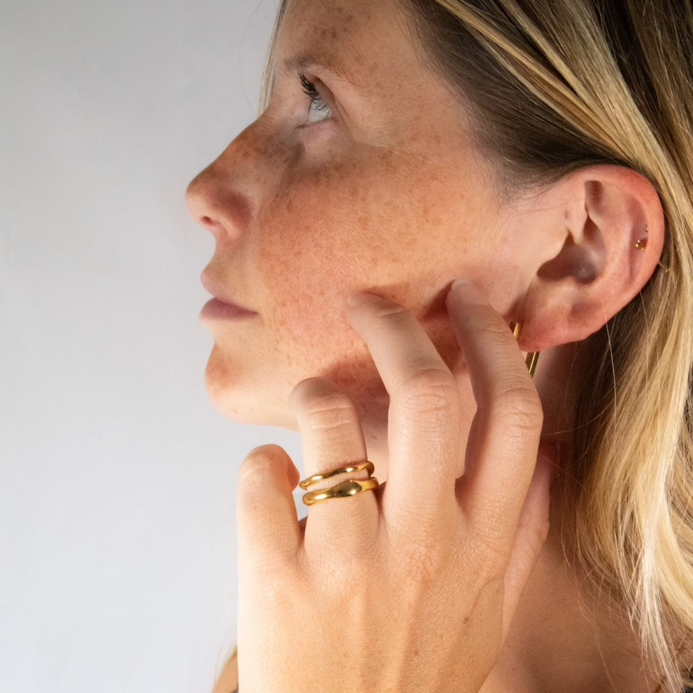 A gold stacking ring made from recycled gold. Made to be worn everyday. Anti-tarnish, sweat and water resistant.