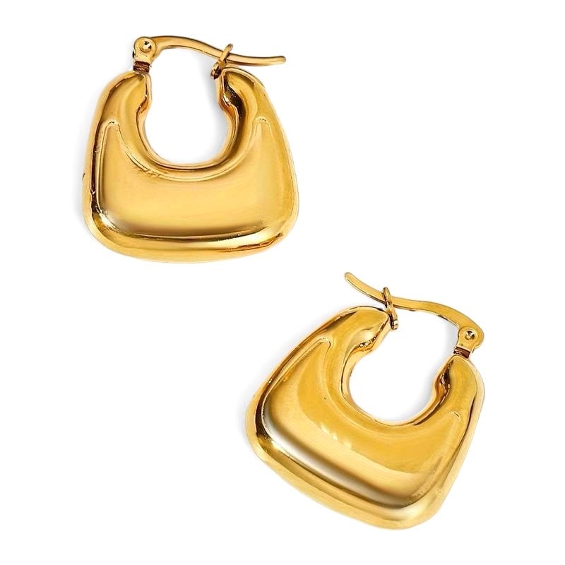 A pair of delicate yet bold hoop earrings with a smooth finish, vintage but modern. Made from recycled gold.