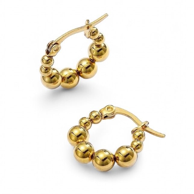 Small popcorn shape hoop earrings made from recycled gold. Designed to be comfortable to sleep in.