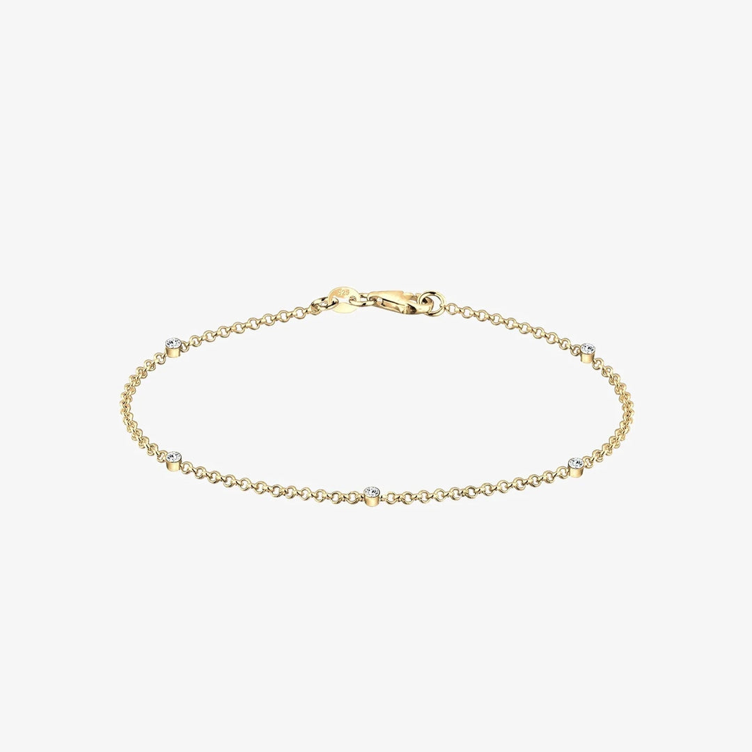 A small and dainty bracelet with gold and stones.


Een klein en sierlijk armbandje met goud en stenen

Un petit bracelet délicat en or et pierres.