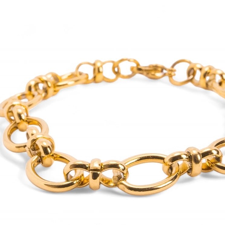 Chunky chain bracelet in gold.

Bracelet à grosse chaîne en or.

Dikke schakelarmband in goud.