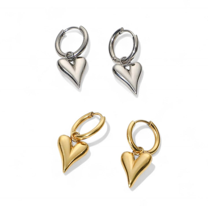 Heart hoops in gold and silver


Harthoepels in goud en zilver

Créoles coeur en or et argent