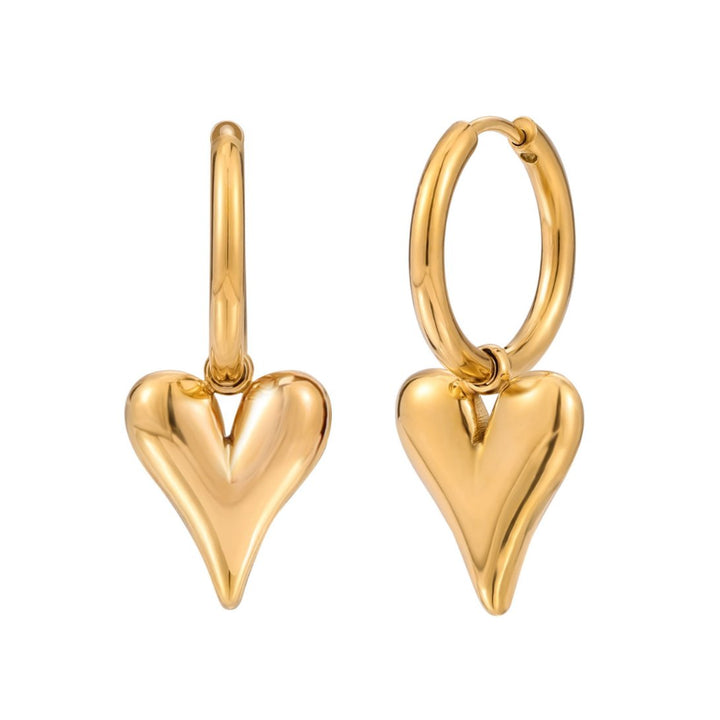 Heart hoops in gold and silver


Harthoepels in goud en zilver

Créoles coeur en or et argent