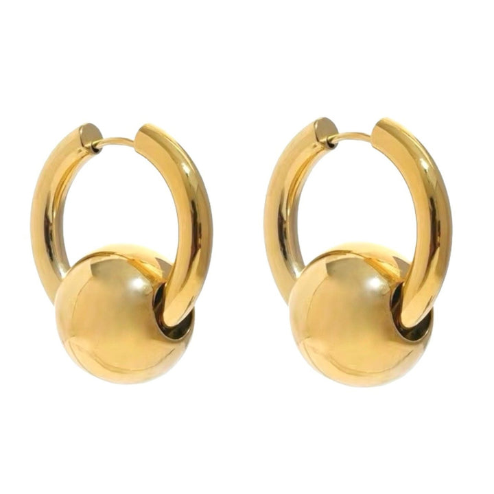 A pair of gold hoops with a ball that can be removed to have two styles. In gold and silver. The perfect gift.