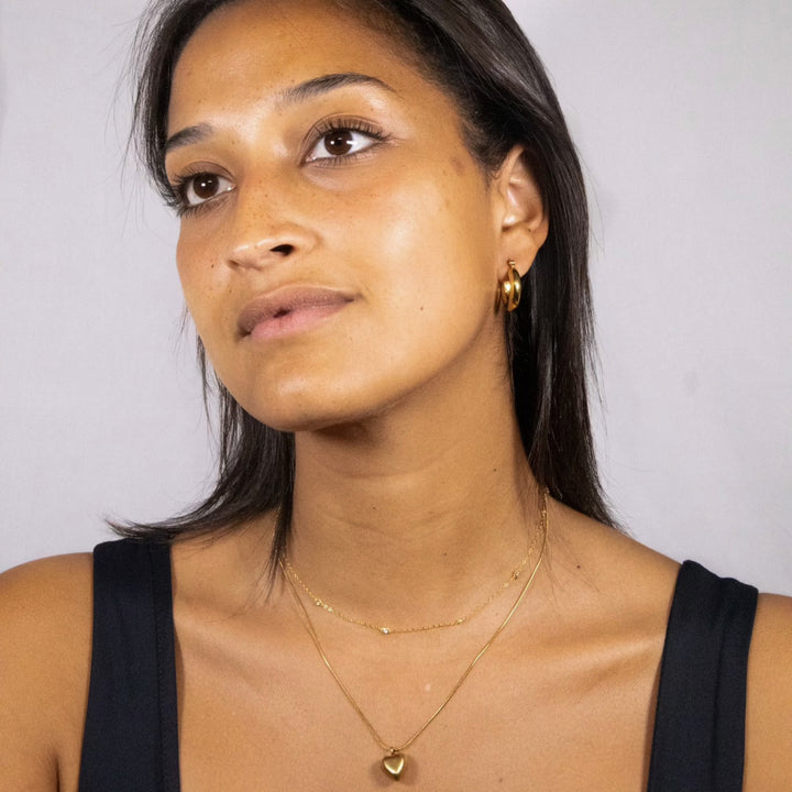 A heart necklace on a gold chain. Made from recycled gold. A perfect gift for the one you love.