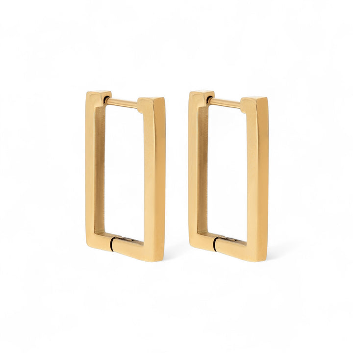 A rectangular shaped huggie hoop earring in gold/silver. Comfortable enough to sleep in. Made from recycled gold or silver.