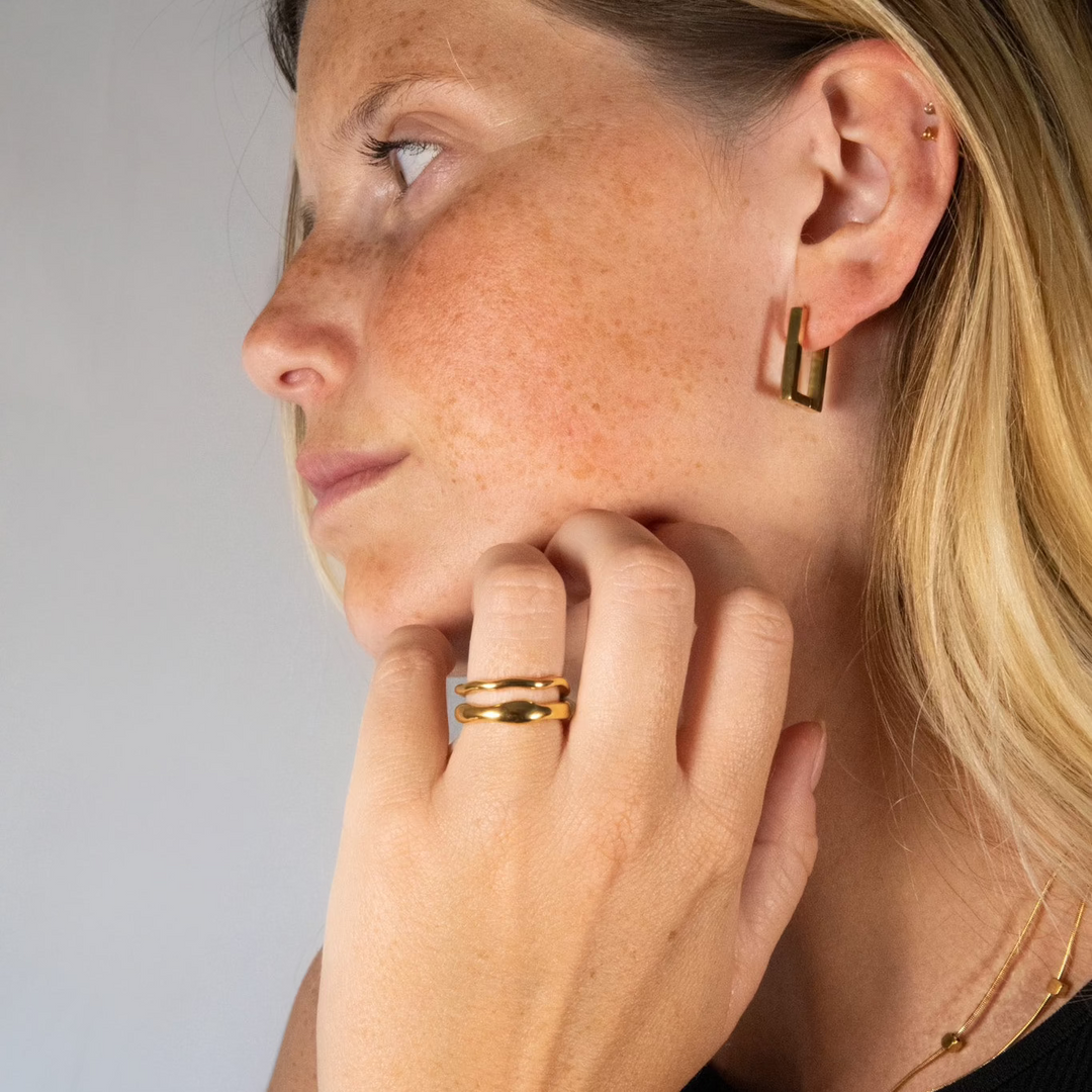 A gold stacking ring made from recycled gold. Made to be worn everyday. Anti-tarnish, sweat and water resistant.