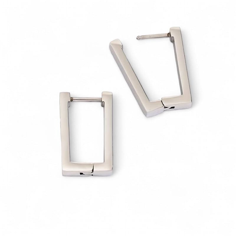 A rectangular shaped huggie hoop earring in gold/silver. Comfortable enough to sleep in. Made from recycled gold or silver.