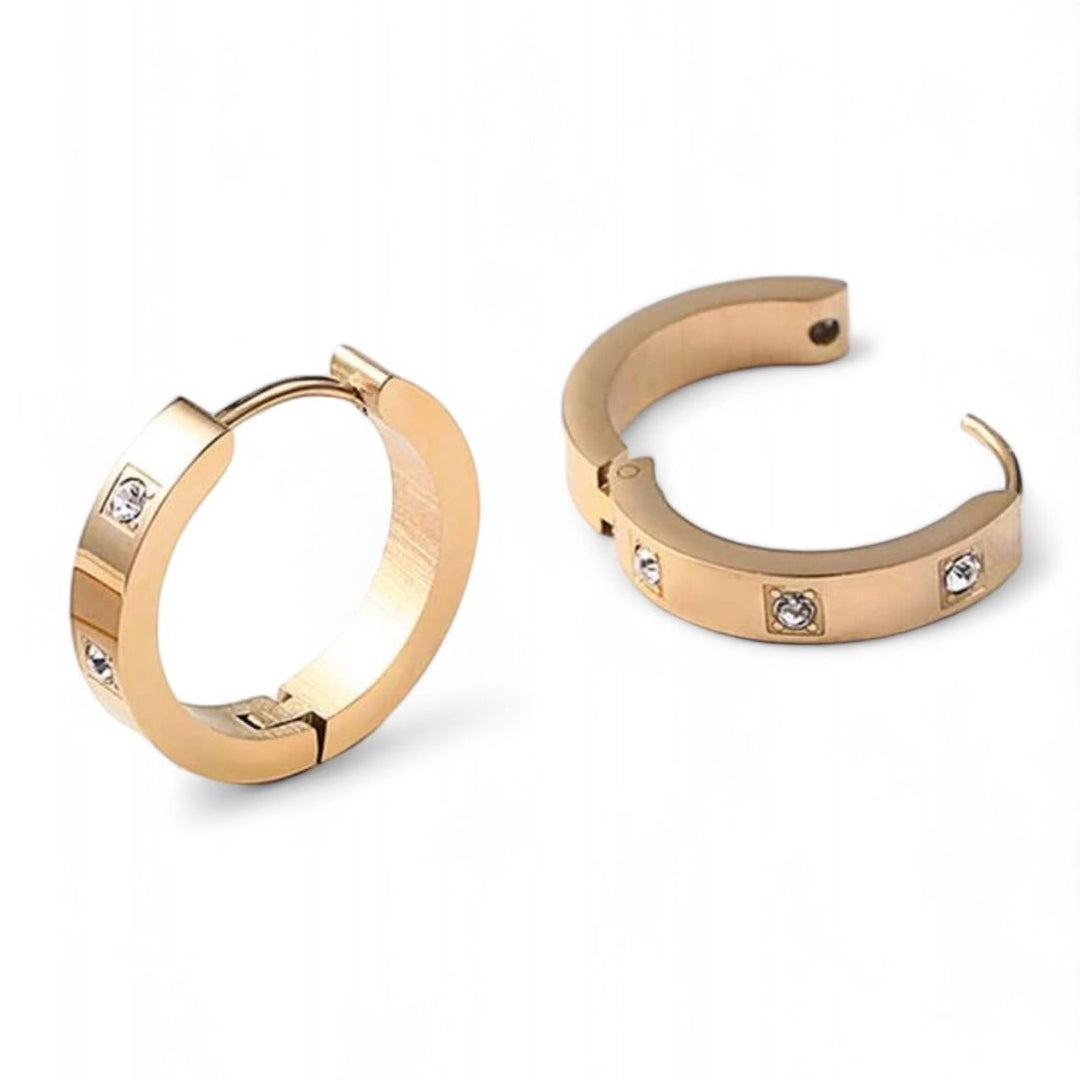 Sustainable gold and silver hoop earrings with sparkle.