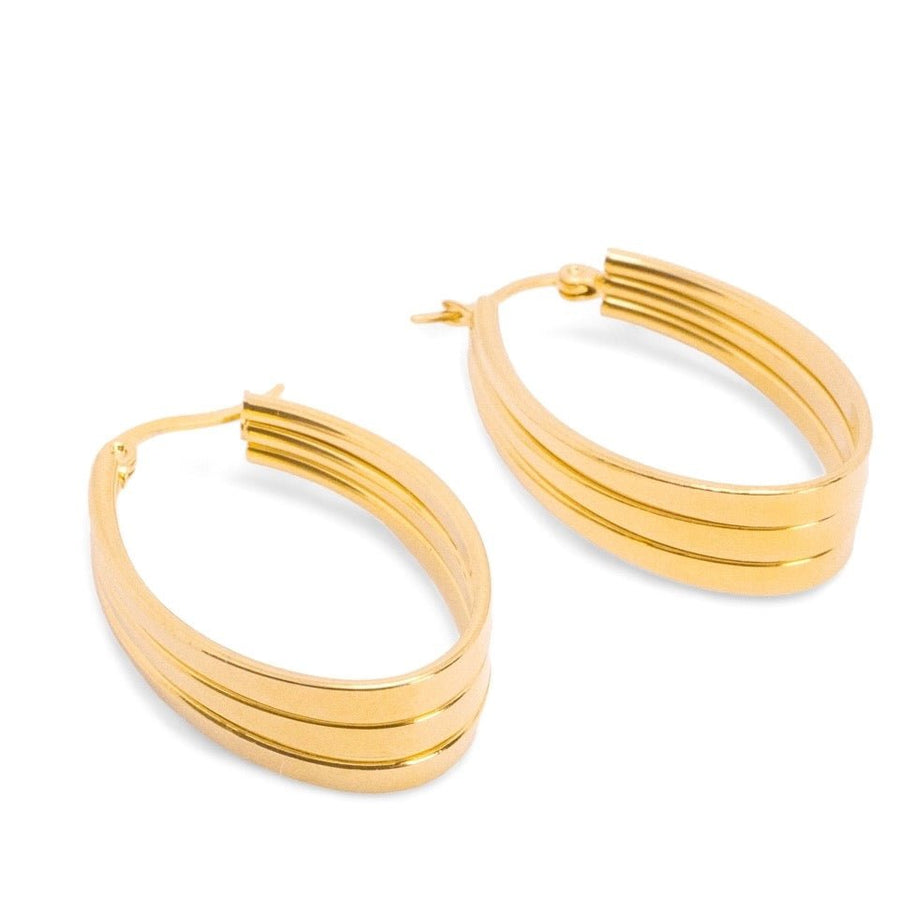 Hoop earrings in gold designed to make a statement.Light-weight earrings.Made from recycled gold.Anti-tarnish. Perfect gift.